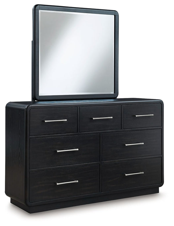 Inspired by art deco design, this softly shaped dresser with mirror makes a lasting impression in a simply stunning way. Its magnificent curved silhouette is enhanced by a rich layered black finish on the textured wood grain surface. This is the statement