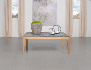  flaunting a rectangular top that offers the luxurious look of marble without the weight. Its high-pressure laminate surface