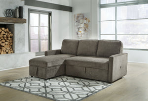 This sectional with pop up bed is an essential for small spaces and hosts with the most. The multifunctional piece is fashioned with dark gray upholstery that suits styles from transitional to modern. Its pop up bed provides extra sleeping space for guest