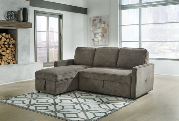 This sectional with pop up bed is an essential for small spaces and hosts with the most. The multifunctional piece is fashioned with dark gray upholstery that suits styles from transitional to modern. Its pop up bed provides extra sleeping space for guest