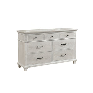 The Silver Sands Dresser combines durability and quality construction, crafted from solid pine, manufactured woods, and oak wood veneers for a strong and stable piece. Its transitional style merges clean, simple lines with a rustic wood finish, creating a
