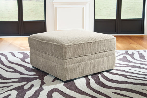  with easy-to-access storage space that keeps throw blankets on 