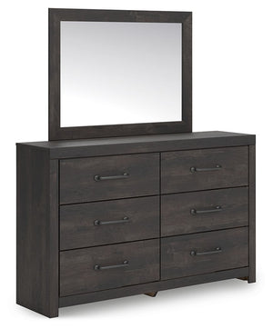 This dresser with mirror puts a casually chic twist on everyday function. Its rustic charcoal finish pairs well with other neutrals and pops of color alike, giving you the flexibility to change up your aesthetic as you please. Smooth-gliding drawers keep 