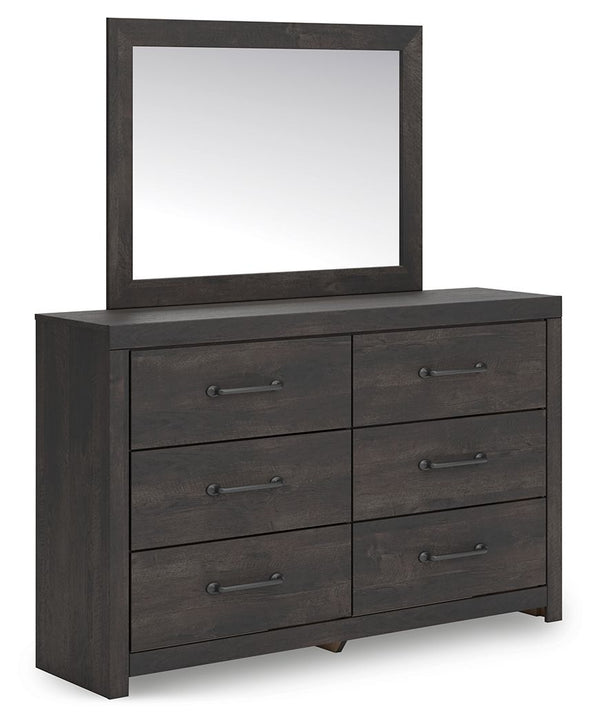 This dresser with mirror puts a casually chic twist on everyday function. Its rustic charcoal finish pairs well with other neutrals and pops of color alike, giving you the flexibility to change up your aesthetic as you please. Smooth-gliding drawers keep 