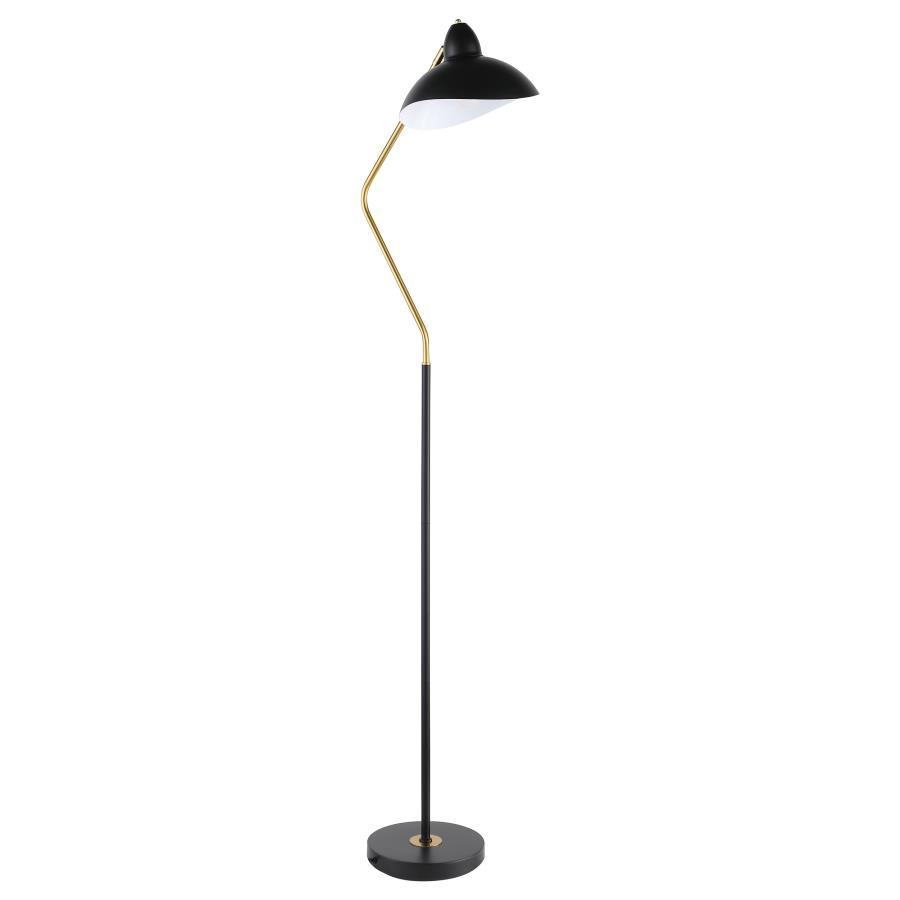 A contemporary floor lamp takes a classic mid-century inspired profile and updates it with modern flair. In black and gold, the lamp boasts a slim post with a V-curved arm that ensures bright downlighting perfect for an armchair or desk. A black metal sha