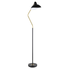 A contemporary floor lamp takes a classic mid-century inspired profile and updates it with modern flair. In black and gold, the lamp boasts a slim post with a V-curved arm that ensures bright downlighting perfect for an armchair or desk. A black metal sha