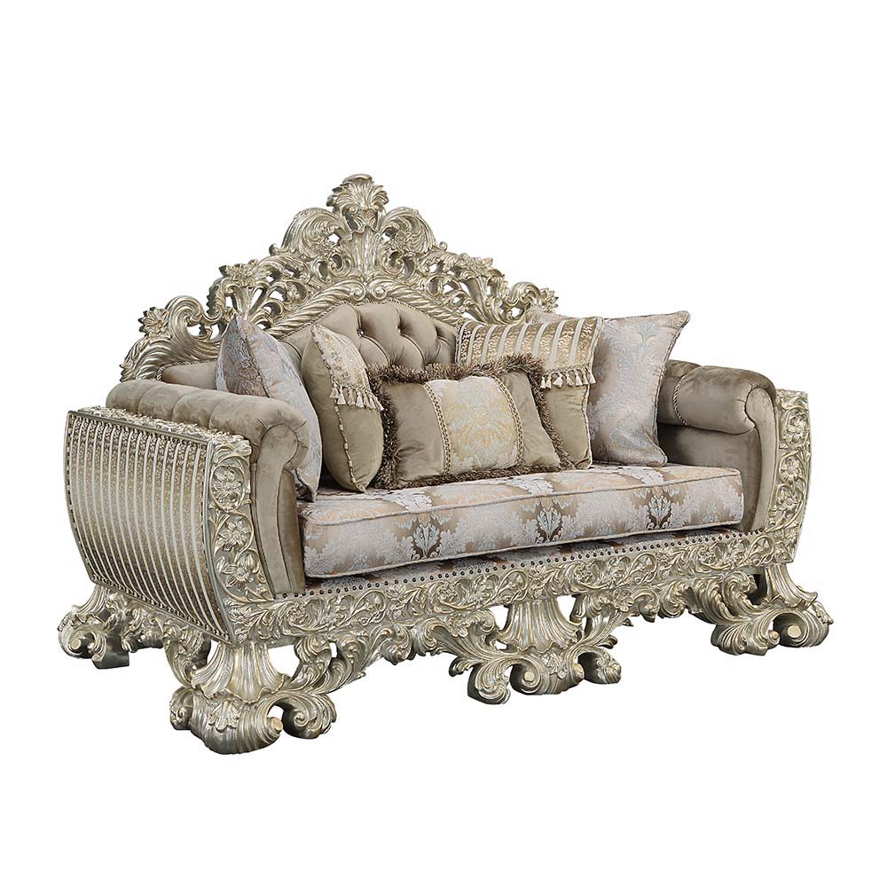 Leave your guests speechless when they enter your living room with the Sorina sofa. The stunning gold outer frame is flawlessly paired with the crystal-like button tufting to create a rich look. The damask upholstered seat cushion perfectly complements th