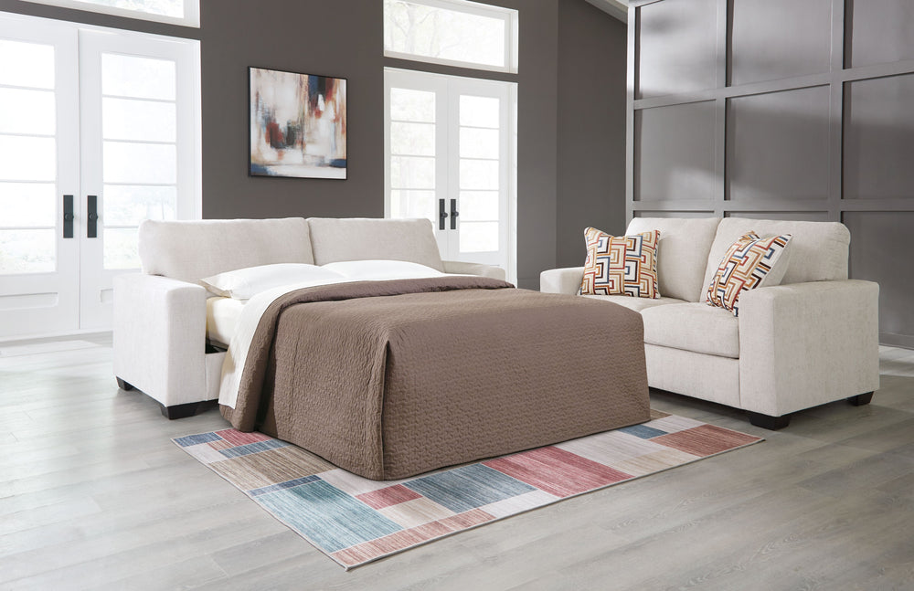 Looking to make a simply chic statement with color? Liven up your living room with this queen sofa sleeper. Its trend-right light neutral upholstery is a perfect blank canvas for adding pops of color. Bold and eclectic accent pillows complete the look. An