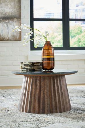  the mixed-material accent piece wows with a marble top and a fluted wood base. This organic beauty can be used on its own or grouped with other piece