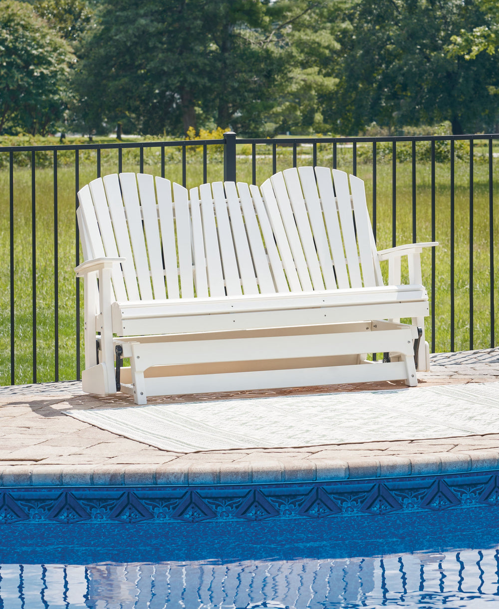 Drift away from everyday worries and into outdoor bliss with this glider loveseat. Dressed in a crisp white, the Adirondack-inspired design has a classic feel. It weathers sunny summer days and cozy winter nights with durable MEGA-TUFFÂ® HDPE material. A 