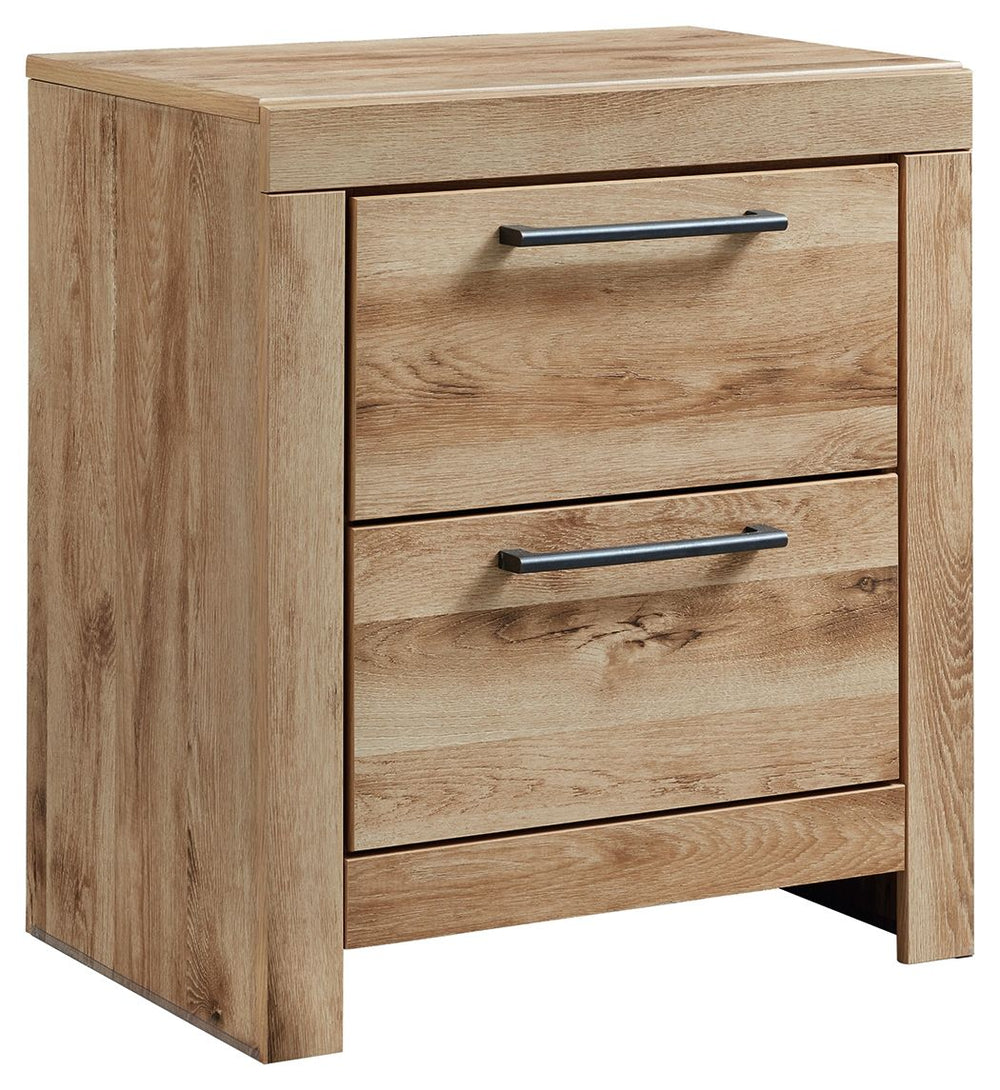 Inspired by natural beauty, refined to perfection. This nightstand brings cozy outdoor vibes to your bedroom with its warm and inviting golden rustic finish. Antiqued gunmetal handles adorn the two drawers on its framed front for an industrial touch, whil