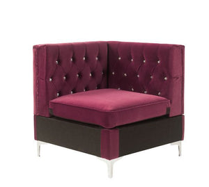 Nothing screams luxury like this Jaszira modular upholstery group. Each piece is enveloped in a luxurious velvet upholstery and showcasing button tufting, and a nail head trim accent for a tailored touch. Foam padding offers comfortable cushioning. Design