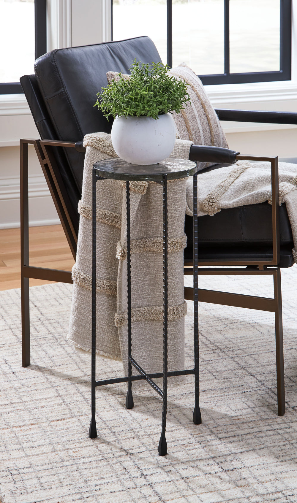 Small in stature but big on function, this accent table is ultra-chic next to a sofa or standing alone. Its size is well-suited to narrow spaces, making it a handy spot to rest drinks or remotes. Place a sculpture, a succulent or a photo frame on top as a