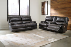 Striking form, meet contemporary function. This power reclining set combines your ideal comfort features, like one-touch reclining and adjustable headrests, into one sophisticated package. With a design defined by the luxe look of black leather, this set 