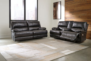 Striking form, meet contemporary function. This power reclining set combines your ideal comfort features, like one-touch reclining and adjustable headrests, into one sophisticated package. With a design defined by the luxe look of black leather, this set 