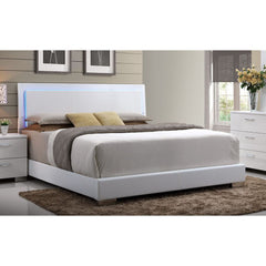 High gloss white finish wraps the Lorimar bedroom collection for a casual yet contemporary look to be added to your home. Featured PU footboard adds different look of this bed increasing variety to your sweet modern master room.<br/><br/><b>Product Featur