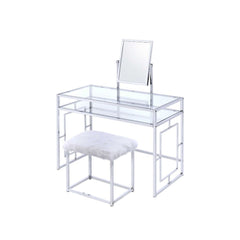 Offering plenty of storage with its contemporary style, this Carenze II vanity desk with 1 open compartment & tilt mirror is a perfect choice for getting ready in the morning. Image sitting down in front of this lovely vanity desk to apply your makeup and