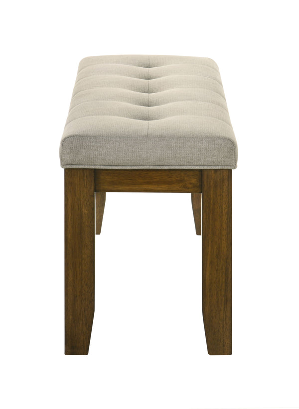  perfect for both casual and formal settings. The tailored chairs and tufted bench are upholstered in a soft neutral fabric