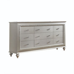 The Kaitlyn dresser provides a commanding presence in any room. Crafted with a transitional look that is an ideal addition to any bedroom, the dresser is accented with textured front and a crystal-like sparkling trim. Its crystal-like trimming creates daz