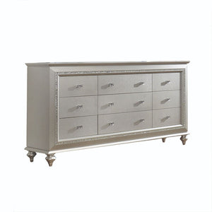 The Kaitlyn dresser provides a commanding presence in any room. Crafted with a transitional look that is an ideal addition to any bedroom, the dresser is accented with textured front and a crystal-like sparkling trim. Its crystal-like trimming creates daz