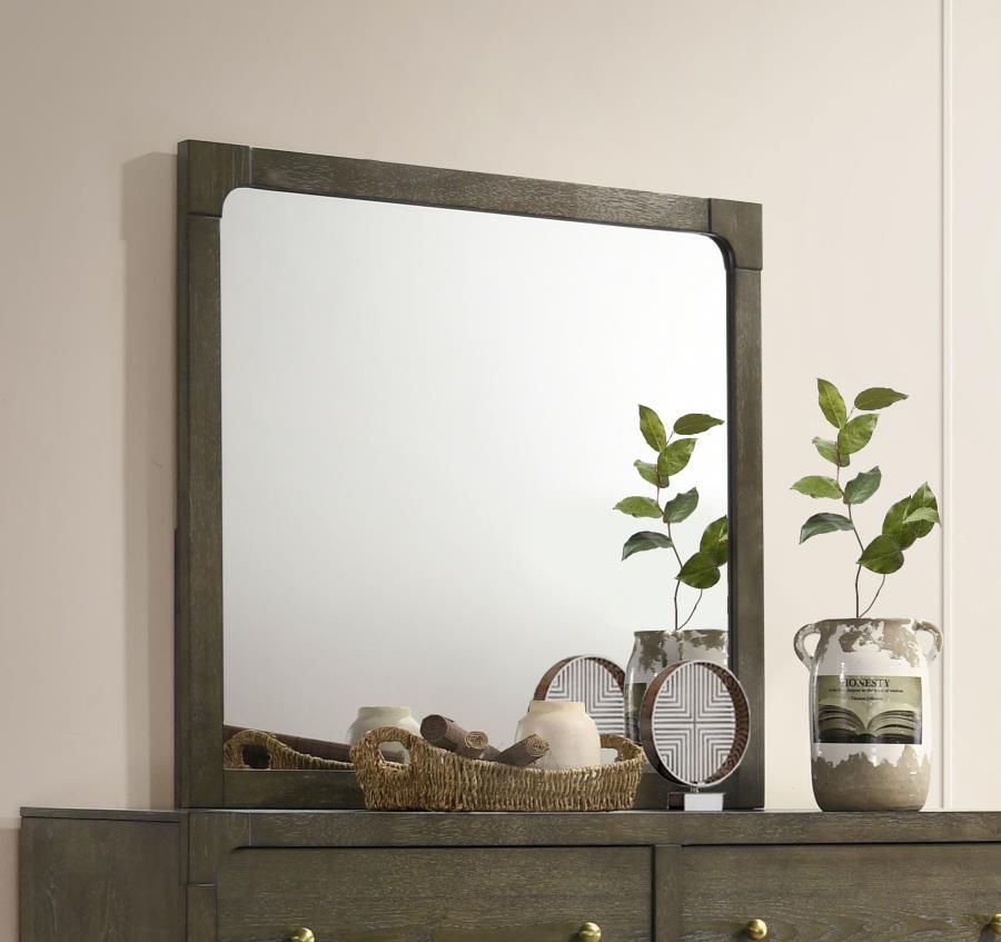 Complete your dresser with this elegant mirror, designed to enhance the overall look of your bedroom. The dark cocoa finish complements the transitional design, while the sturdy construction ensures durability. This mirror adds a touch of sophistication t