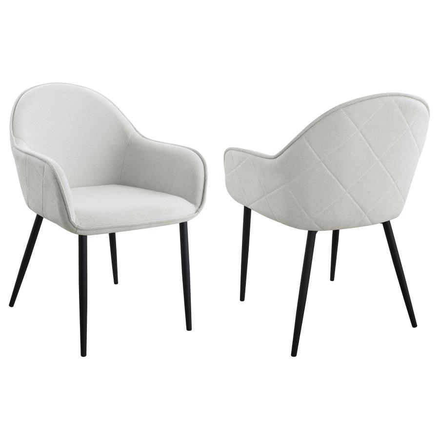 Introduce modern sophistication to your dining space with these timeless dining side chairs. Their elegant silhouette and full wrap-around seats exude timeless charm. The diamond pattern details add a touch of contemporary flair, while the rich upholstery
