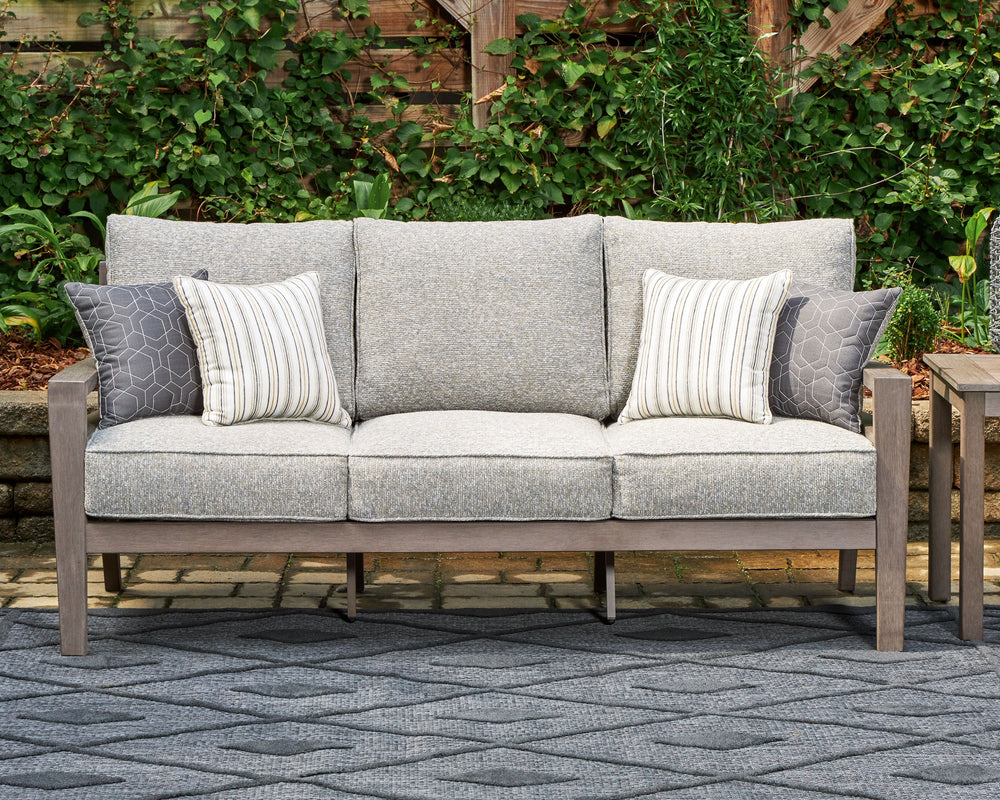 This sofa is a stylish outdoor piece with staying power. Built for longevity with Weatherwood, an engineered resin polymer with the appearance of wood, it indulges you in contemporary design without sacrificing durability. Stunning form and canâ€™t-miss f
