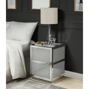  this table screams glamour. The beveled mirrored trim reflects light and enhances th