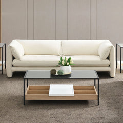 Create a serene and stylish living space with this elegant Jaeda sofa upholstered in beige linen. Its soft tones blend seamlessly with any decor, while the plush cushions provide exceptional comfort. Perfect for both casual lounging and sophisticated gath