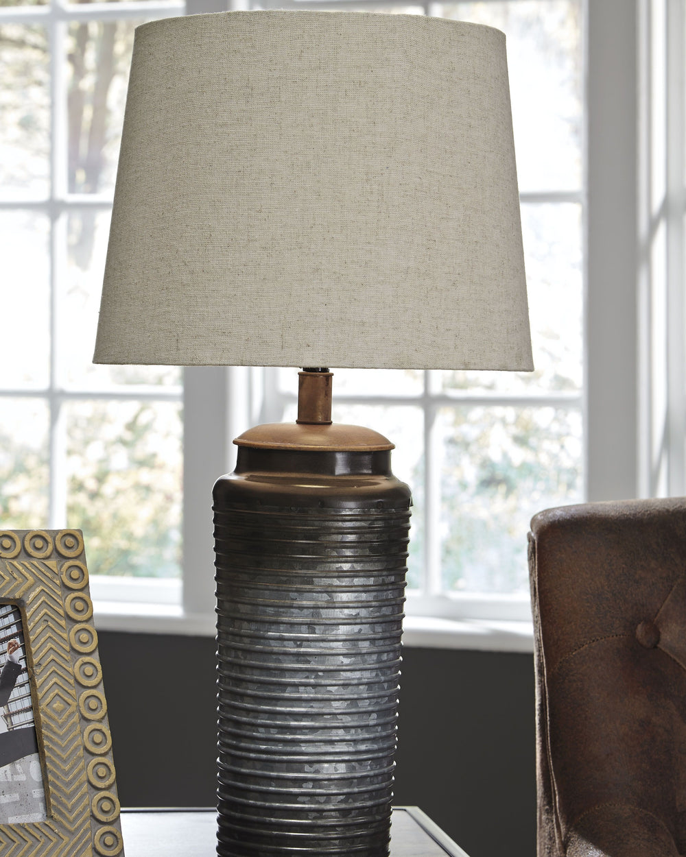 Grace your space with the earthy elegance of this metal table lamp. A top-and-bottom ombre effect on the galvanized metal base is delightfully different. Ribbed texturing adds that much more interest.<br><br><b>Additional Dimensions</b><br><ul><li>Shade: 
