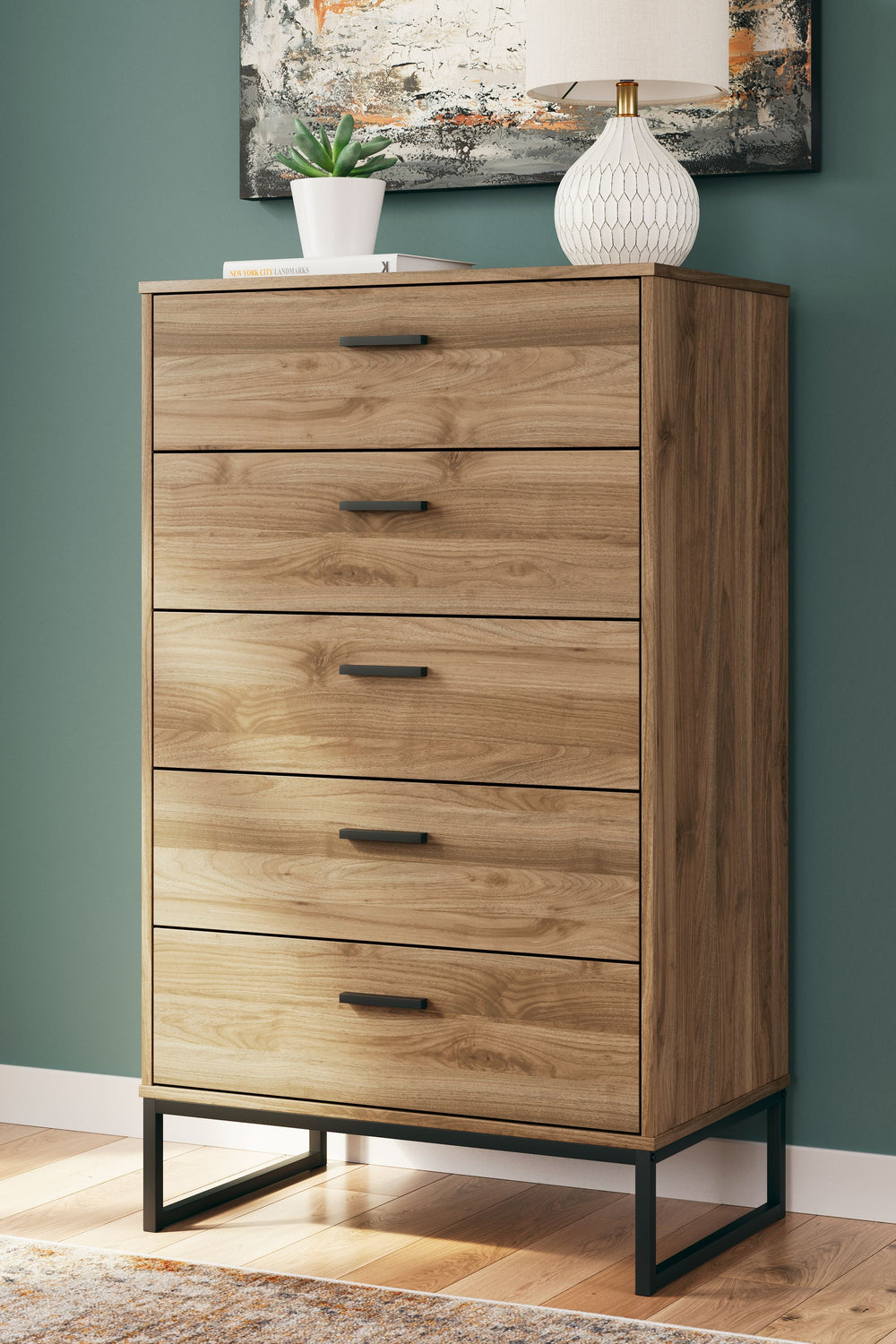 Is your bedroom in need of a refresh? And do you love mid-century modern design? Then this chest of drawers is calling your name. Simple lines and an industrial-chic vibe will seal the deal. Settle into its laid-back style, and plan to stay for a while.<b