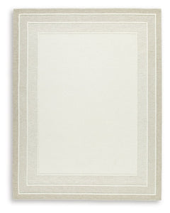 With its simple border design and soft, neutral color palette, this hand-tufted rug brings a touch of casual elegance to your abode. Its plush wool pile feels luxuriously soft underfootâ€”perfect for adding warmth and texture to your entertainment area, b