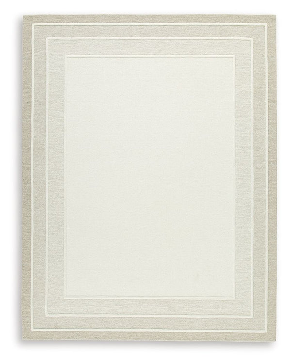With its simple border design and soft, neutral color palette, this hand-tufted rug brings a touch of casual elegance to your abode. Its plush wool pile feels luxuriously soft underfootâ€”perfect for adding warmth and texture to your entertainment area, b