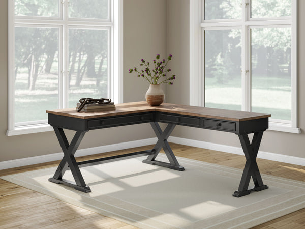  which pairs a warm satin black base with a contrasting butcher block veneer desktop. The drop-down keyboard and tw