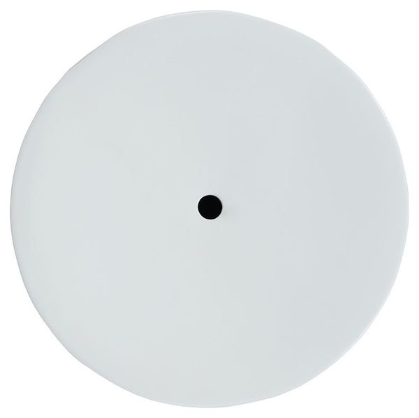  it features bold irregular patterned sides and a minimalist matte white finish