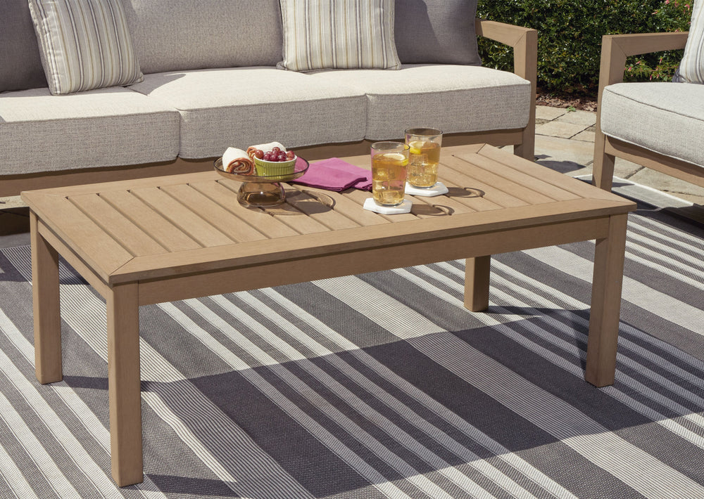 This coffee table is a beautiful addition to any outdoor living space. Effortless in its simplicity, this piece echoes your easygoing sensibilities. Combining durable, cutting-edge engineered materials, its Weatherwood construction in a blond wood color e