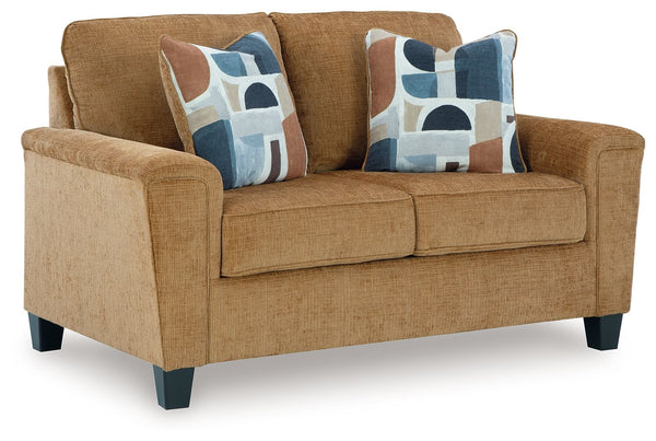 Thereâ€™s something about this loveseat thatâ€™s so easy to appreciate. Maybe itâ€™s the plush upholstery and comforting earthy tone, eager to support your quest for total relaxation. Perhaps it-'s the modern flair of its simple lines, tapered legs and ab
