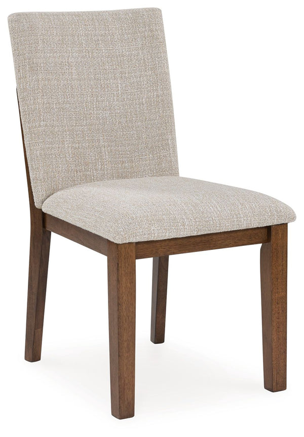 Experience worry-free living with this dining chair. Handle life-'s little messes with ease thanks to washable Next-Gen Nuvellaâ„¢ performance fabric. Designed to effortlessly blend casual and refined aesthetics, the rich brown butcher block veneer exudes