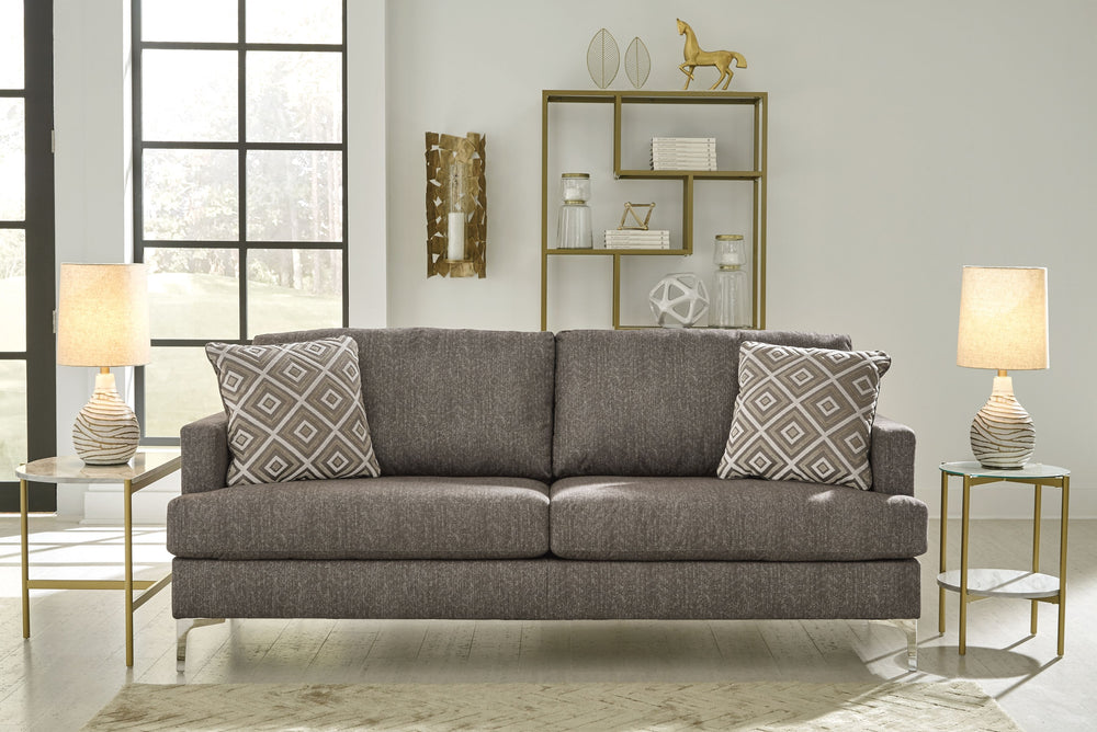 If modern subtlety is your style, settle into the heavenly texture of this sofa. The tremendously soft upholstery has a slight herringbone pattern that adds depth and richness to the java color. The metal accent legs elevate this piece as well as the styl