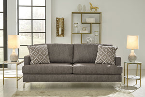 If modern subtlety is your style, settle into the heavenly texture of this sofa. The tremendously soft upholstery has a slight herringbone pattern that adds depth and richness to the java color. The metal accent legs elevate this piece as well as the styl