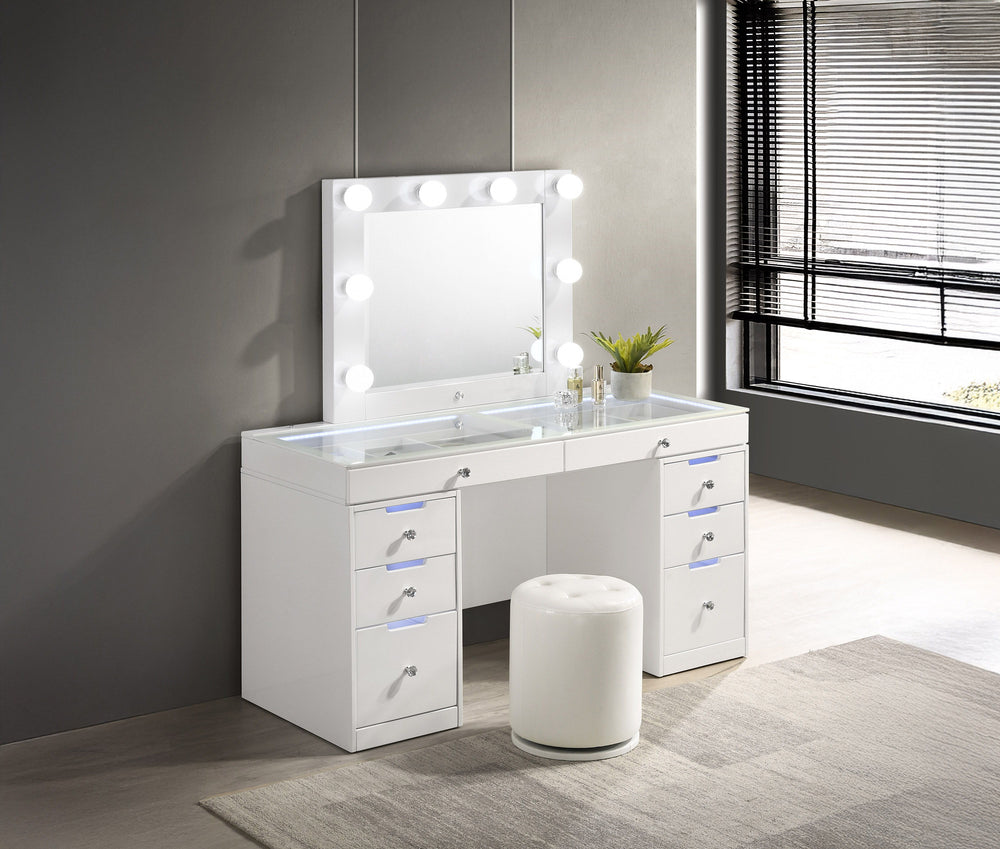 Step into a world of glamour with this sleek and chic vanity set, a perfect fusion of functionality and fashion. Its glossy white finish and clean lines are complemented by the sparkle of crystal-like knobs, adding a touch of sophistication to your person