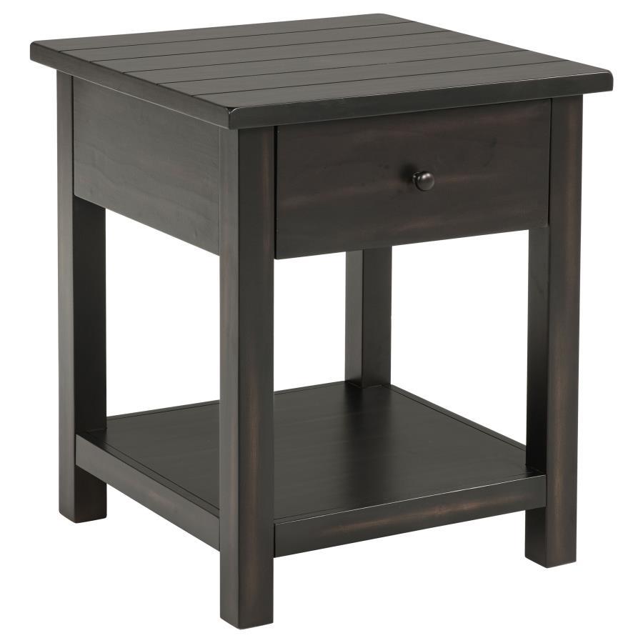 This rustic end table merges classic style with practical storage, making it a charming focal point in any living room. Built from pine wood and reinforced with engineered wood, its square silhouette highlights a subtle, timeworn aesthetic. An integrated 