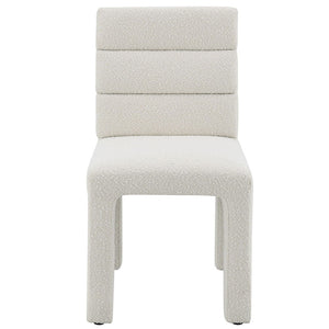  exudes timeless elegance and comfort. Its structured design and plush upholstery make it an ideal addition to any dining or living space. This chair not only provides a chic seating option 