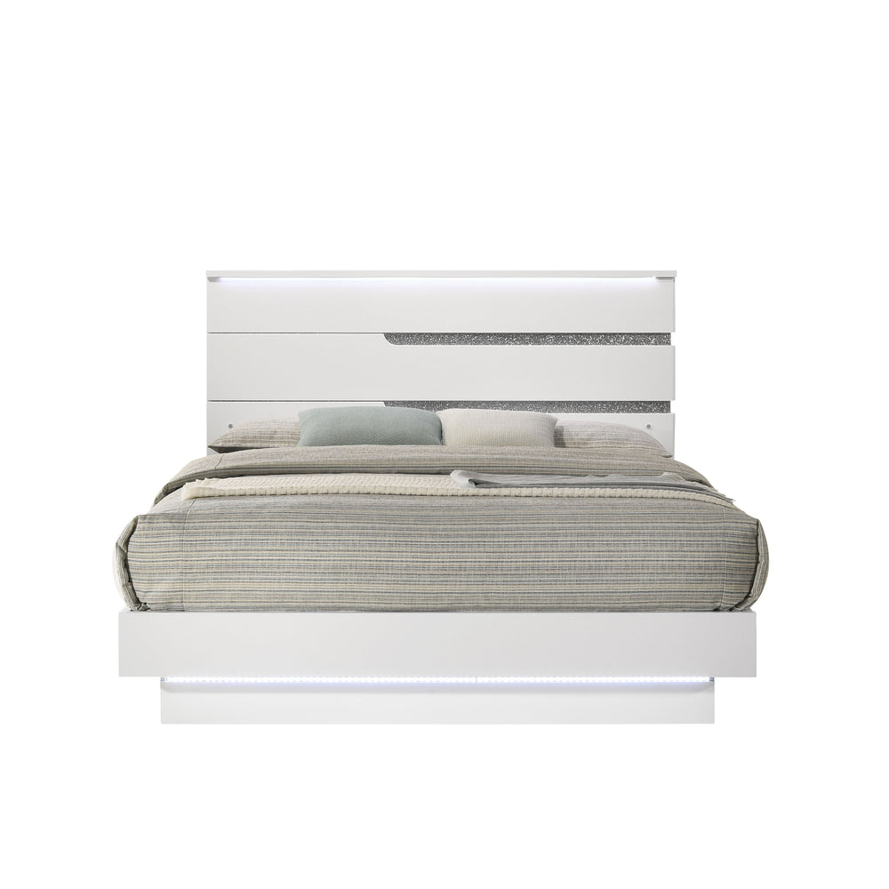 The Paradox Bed in White redefines contemporary elegance with its gleaming white gloss laminate finish that offers both a sleek look and practical benefits such as scratch and water resistance. This bed includes a headboard, footboard, side rails, and a b
