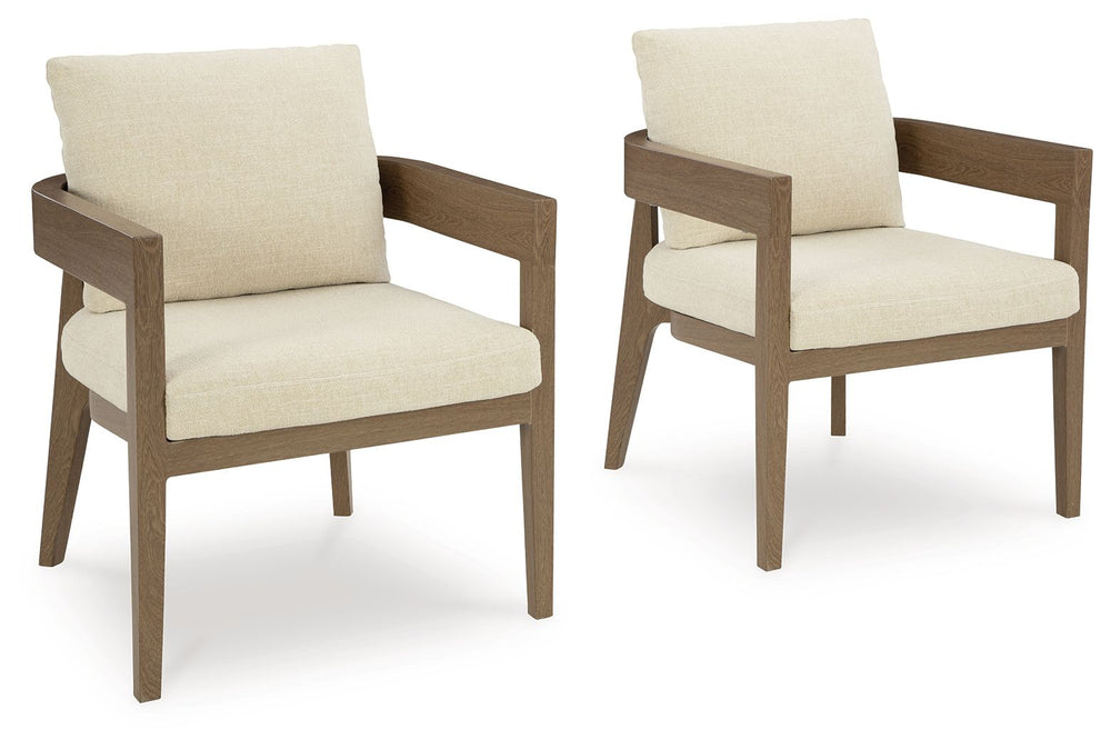 Elevate the appeal of easy-breezy living with this outdoor dining arm chair. Made to look like wood yet suitably durable enough to weather the elements, it-'s sure to serve you and your besties well, year after year. The gently curved chair features cushi