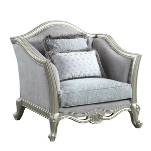 With a timeless silhouette influenced by French beauty, this Qunsia sofa makes a gracious statement in a comforting light gray linen upholstery fabric. Delicate curves invite the eye, while cabriole legs the champagne wooden trim that adds visual impact. 
