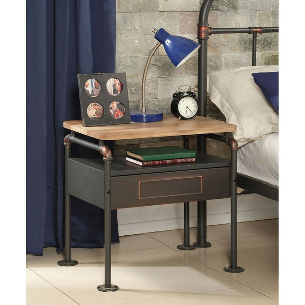 The Nicipolis nightstand combines a vintage look with an industrial design, features antique oak wooden top, sandy gray metal construction, one drawer and one open storage compartment. This piece with casual detail making is the perfect addition to your b