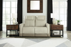  with two-tone upholstery in neutral hues creating subtly striking visual intrigue. And with one-touch reclining