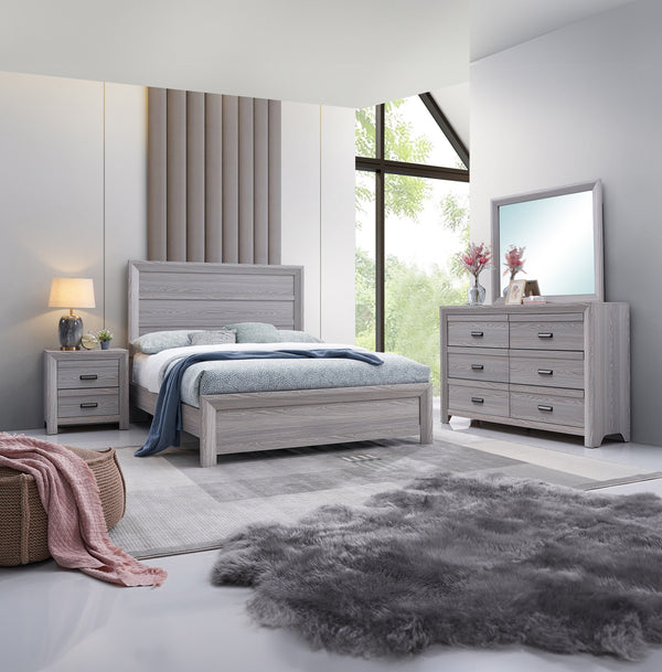 This bedroom set is the embodiment of understated sophistication, featuring a neutral drift wood finish that complements its clean and contemporary design. The robust bed frame anchors the room with a sense of sturdiness and style. Accompanying the bed ar