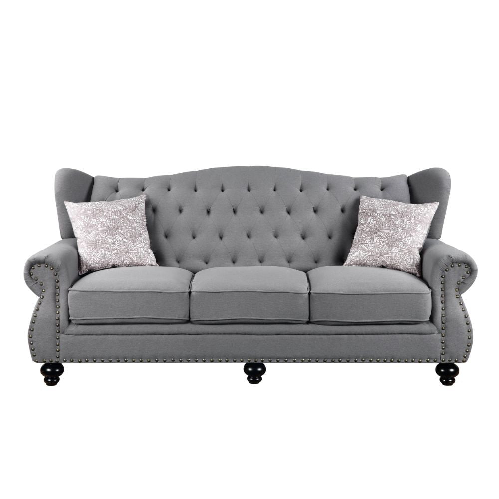 The timeless silhouette of the Hannes sofa collection makes it a great choice for your living area! With classy winged backs accented by buttonless tufting, nailhead trim on the rolled armrests, and wood bun-turned front legs, Hannes combines the best of 